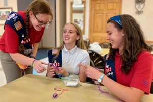 American Heritage Girls crochet project will benefit homeless, refugees