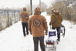 Misioneros de San Francisco evangelize by serving the homeless